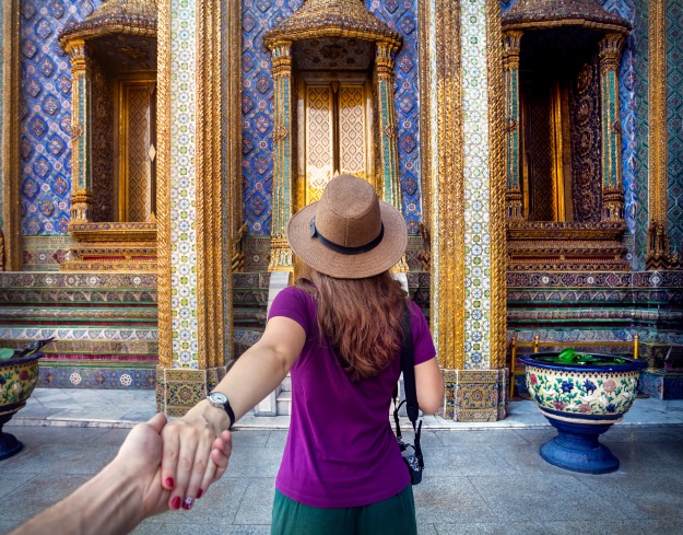 Couple walking into temple