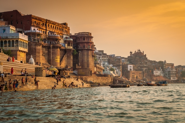 Varanasi's ghats at sunrise from the Ganges