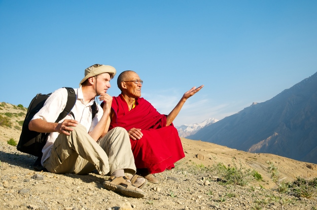 Traveller talking to a monk