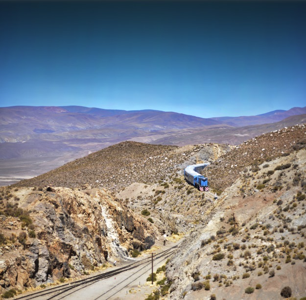 Train travelling through the Andes