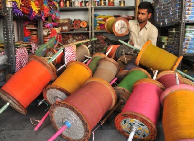 Man making kites