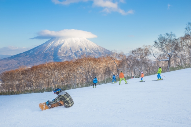 Snow boarder on the slopes in Japan