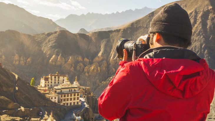 Man taking photos in India