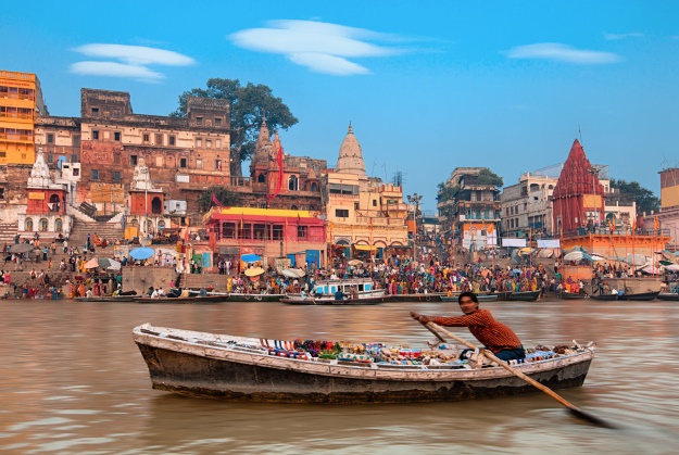 Rowing a boat on the River Ganges Varanasi