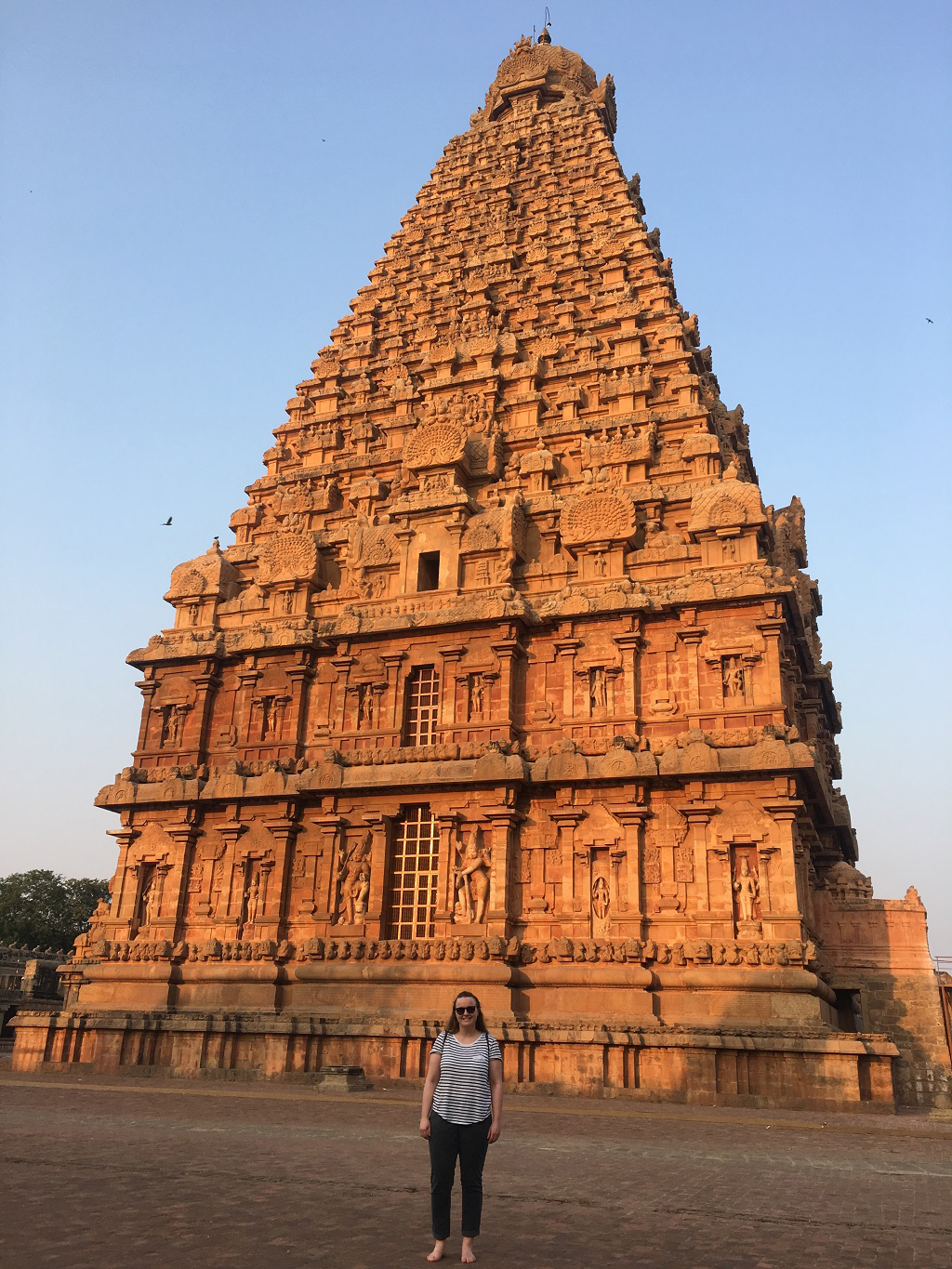 Chloe in front of a temple