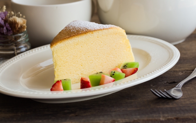 Slice of Japanese cheesecake with fresh fruit