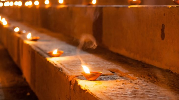 steps lined with hundreds of candles