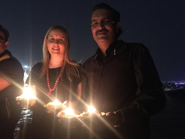 Two people holding candles 