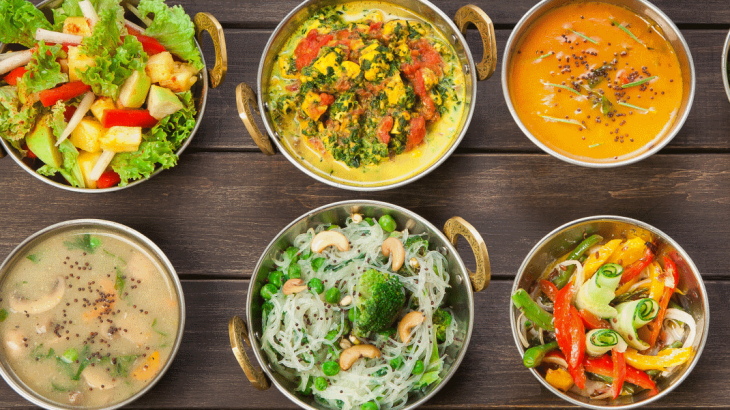 Dishes of colourful vegan curry