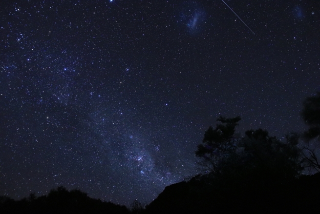 Magellanic clouds visible in the night sky