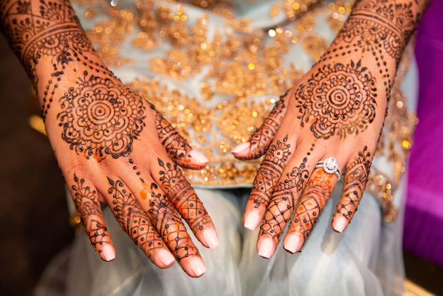 A bride's hands painted with Henna for her wedding