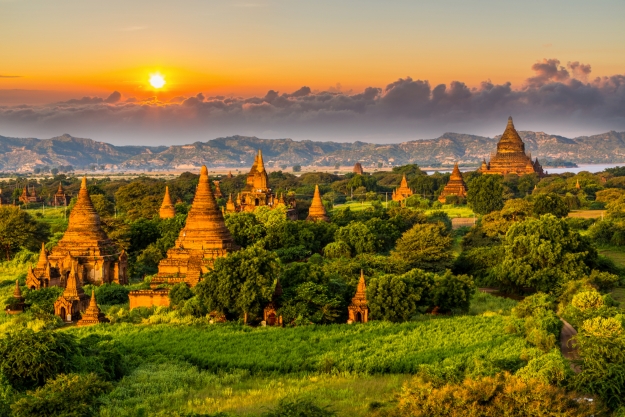 Views over the temples of Bagan and the Irrawaddy River at sunset.