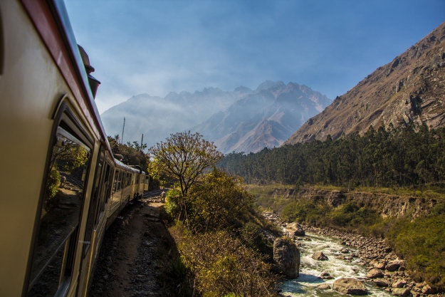 A train travelling through the Andes Mountains to Machu Picchu.
