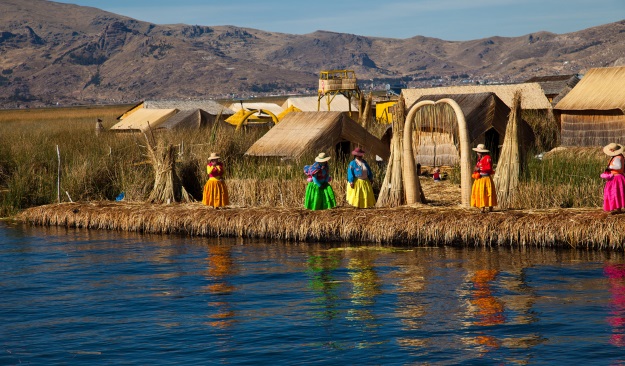 Colourfully-dressed Uros women on the floating islands.