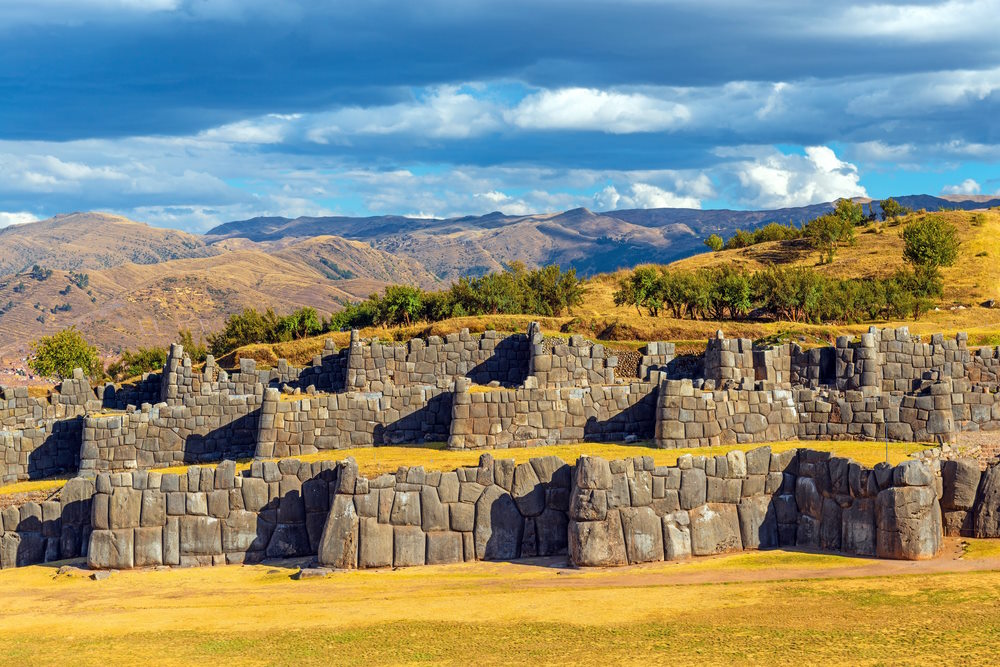 The stone walls and terraces of the old Incan fortress of Sacsayhuamán, set just above the city of Cusco, Peru