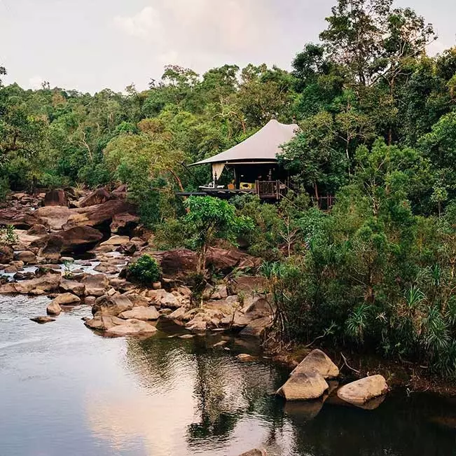 The rainforest-cloaked Cardamom Mountains are Cambodia&rsquo;s best-kept secret. Elevate your experience with a stay in a safari-style suite at Shinta Mani Wild, an ultra-luxe tented camp inside an 865-acre private nature reserve.&nbsp;