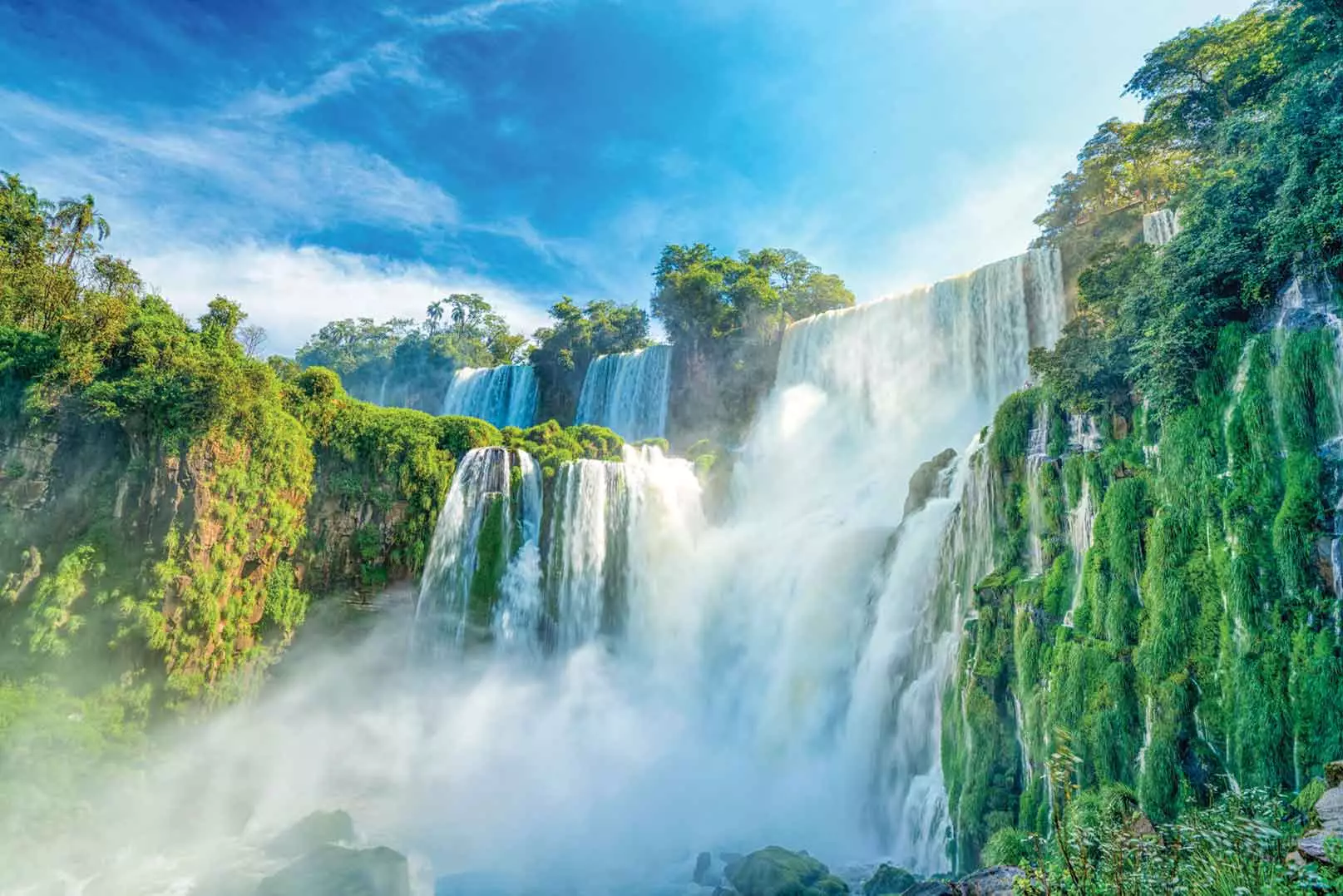 On the border of Argentina and Brazil, the sheer scale, power and beauty of Iguazu Falls can be marvelled at in a variety of ways &ndash; on foot, wandering the boardwalks on either side of the border, by boat on a tour up the famous Devil&rsquo;s Gorge Canyon, or by helicopter! 